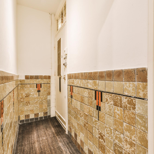 Hallway wall tiling with rustic ceramic tiles